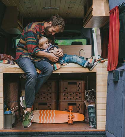 Man and son in RV