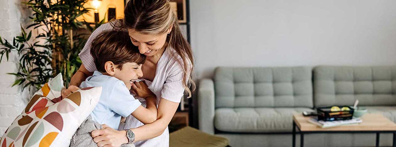 Mom and child in living room.