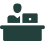 Person at desk icon