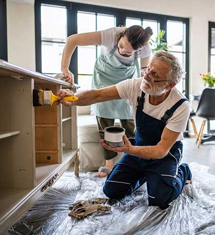 Couple at home doing renovations